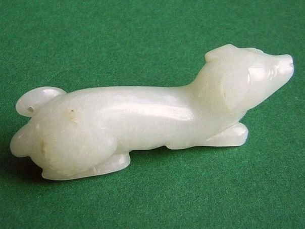 Lying dog with curling tail - (6812)